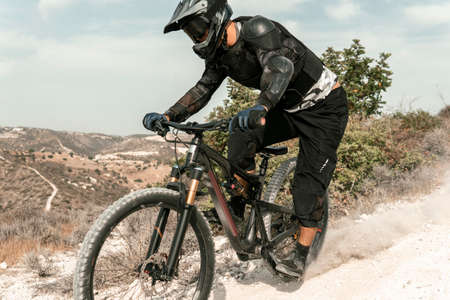 man riding mountain bike outdoors. High quality photoの写真素材