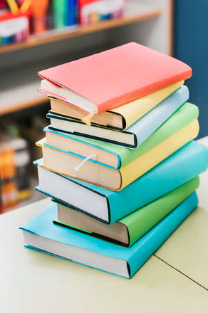 stack multicolored books table. High quality photoの写真素材