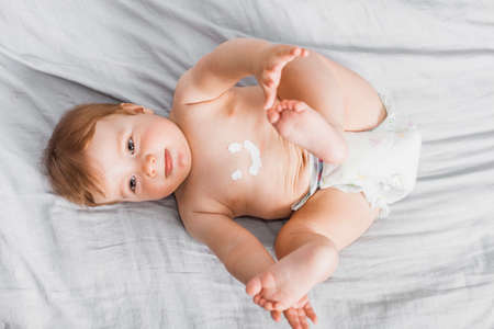 top view baby spread with lotion. High quality photoの写真素材