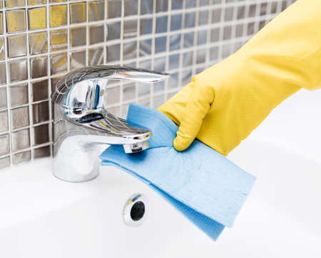 sink faucet getting cleaned. High quality photoの写真素材
