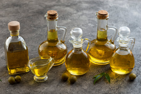 variety containers filled with olive oil. High quality photoの写真素材
