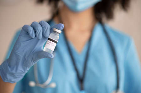female doctor preparing vaccine patient. High quality photo
