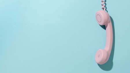 vintage pink telephone composition. High quality photoの写真素材