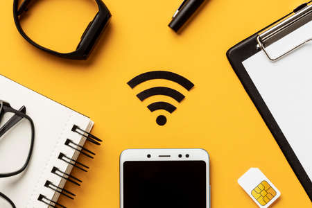 top view wi fi symbol with smartphone sim card. High quality photoの写真素材