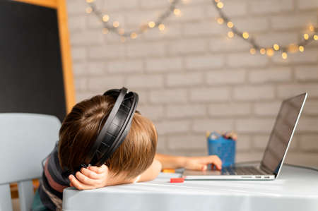 bored child online school interactions. High quality photo