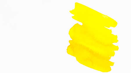 yellow brush strokes isolated white backdrop. High quality photoの写真素材
