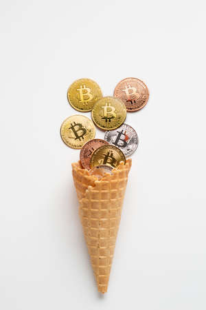 currency ice cream with bitcoin. High quality photoの写真素材