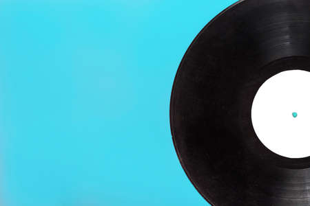 single circular vinyl record blue background. High quality photoの写真素材