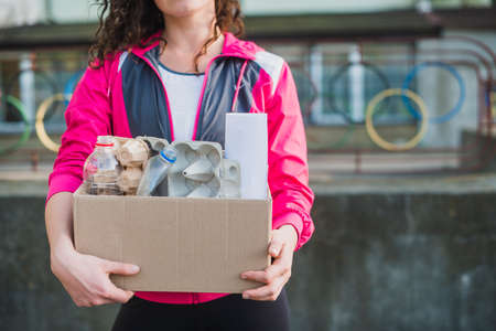 woman holding recycle cardboard box. High quality photoの写真素材