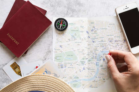 tourist choosing place map. High quality photo