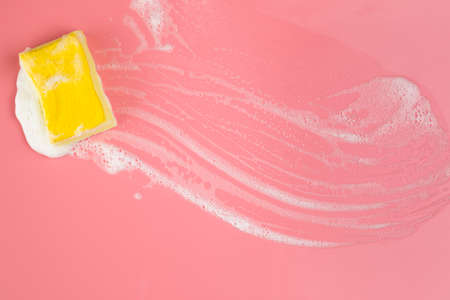 top view sponge with foam pink background. High quality photoの写真素材