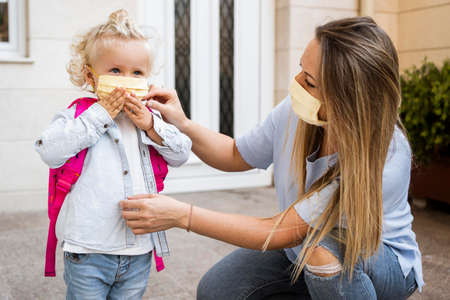 mother child with medical masks. High quality photoの写真素材