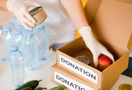 high angle boxes with provisions food day donation. High quality photoの写真素材