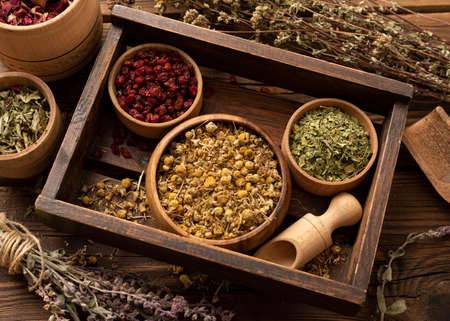 natural various herbs wooden box high view. High quality photoの写真素材