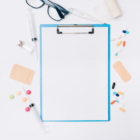 glasses medications around clipboard. High quality photoの写真素材