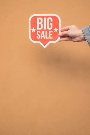 person holding red sign. High quality photoの写真素材