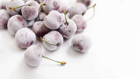 frozen cherries white background. High quality photoの写真素材