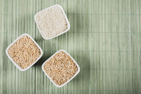 natural white brown long flat uncooked rice bowls placemat. High quality photoの写真素材