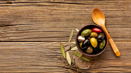 olives mix wooden spoon with copy space. High quality photoの写真素材