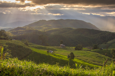 The mountain with background ray lighting in the evening in Mae chaem, Chaing Mai, Thailandのeditorial素材