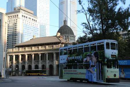 With a history of more than 100 years, the colorful Hong Kong trams are still running on the streets of Central and in front of the Court of Final Appeal.のeditorial素材