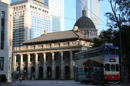 With a history of more than 100 years, the colorful Hong Kong trams are still running on the streets of Central and in front of the Court of Final Appeal.のeditorial素材