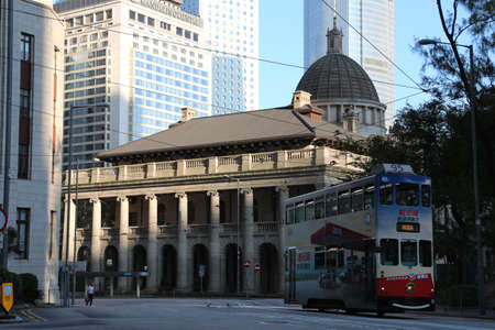With a history of more than 100 years, the colorful Hong Kong trams are still running on the streets of Central and in front of the Court of Final Appeal.のeditorial素材