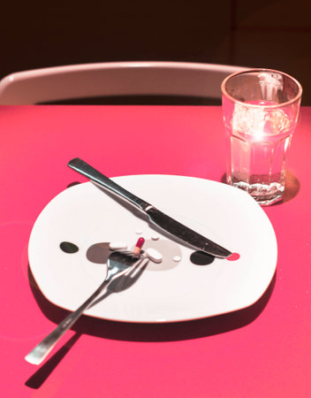 Plate with pills to eatの写真素材