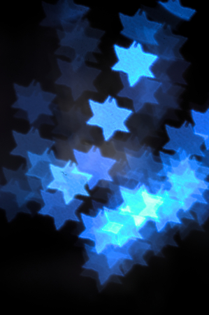 image designed as a background for some Christmas design in which blue and white stars are observed...