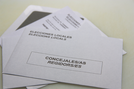 Ballot and envelope to exercise the vote in the elections of the councilors in the municipalities of Spain. Translation of the text in Spanish and Catalan: Local Elections and Councilorsの写真素材