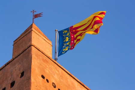 Detail of the top of the tower of Torrent where the flag of the Comunitat Valenciana fliesの写真素材
