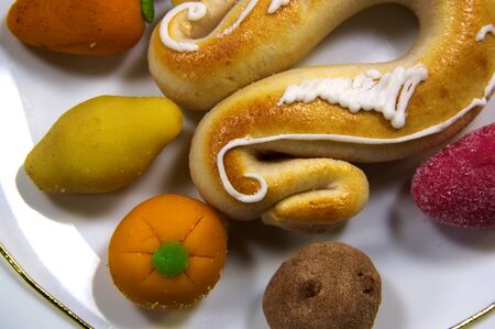 Close-up of a plate with marzipan shaped fruit typical of the Valencian festival of San Dionisio, on October 9の写真素材