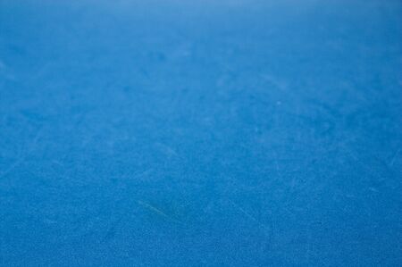 Image of a light blue surface with some texture. Useful as a background with copy space
