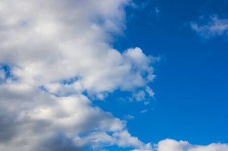 In the image as the gray storm clouds give way to the blue sky leaving room for texts and for...