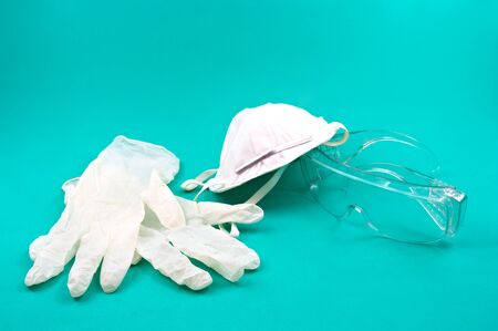 A mask, gloves and individual protection glasses to prevent the spread of possible viruses that may...