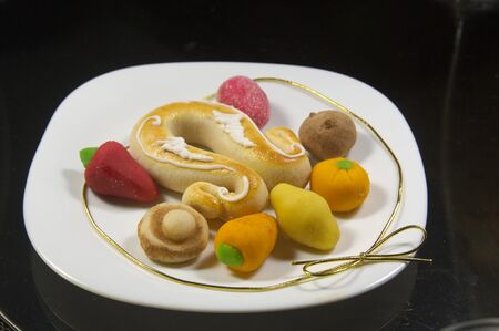 Close-up of a plate with typical Valencian sweets to celebrate the day of San Dionisio, on October 9の写真素材