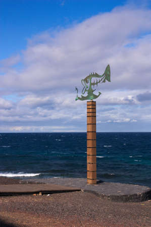 August, 2015. Las Caletillas, La Candelaria, Santa Cruz de Tenerife, Canary Islands, Spain. Image of a landmark sculpture The Vane of Fish design Tenerife sculptor William Batistaの写真素材