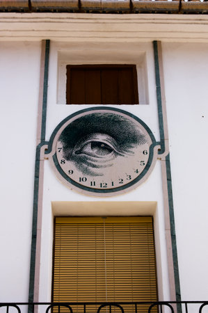 July, 2019. Otos, Valencia, Spain. Close-up of one of the sundials (Polifem by Manuel Boix) of the town Otos in Valencia (Spain)のeditorial素材