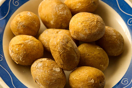 Detail of a "tapa" of Canarian wrinkled potatoes, a typical snack from the Canary Islands in Spainの写真素材