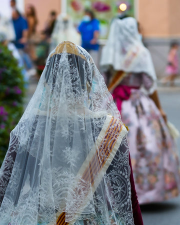 September, 2021. Valencia, Spain. Image of some falleras with the traditional Valencian dress on the...
