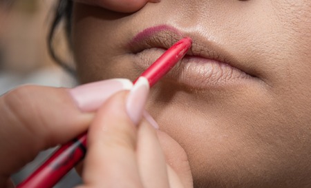 Wedding makeup artist making a make up for brideの写真素材