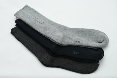 Three pair of male socks isolated on a white backgroundの写真素材