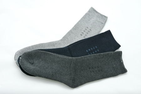 Three pair of male socks isolated on a white backgroundの写真素材