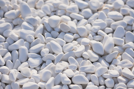 White pebbles texture or background. White gravel background.の写真素材