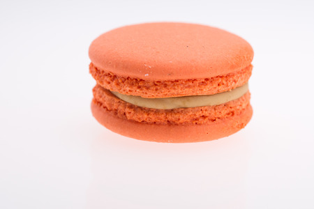 Orange  Macaroons  isolated on whiteの写真素材