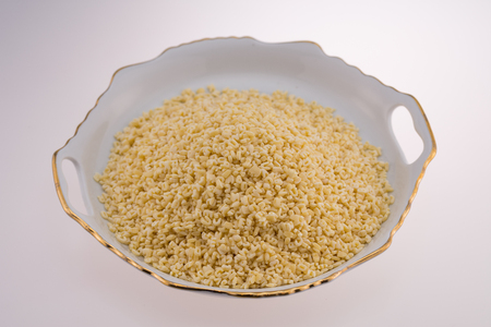 Pasta letters in a porcelain dishの写真素材