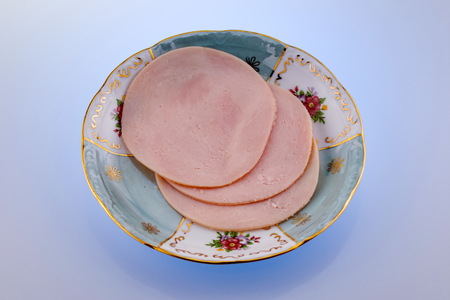 Salami ,turkey sausage , in a luxury porcelain dishの写真素材