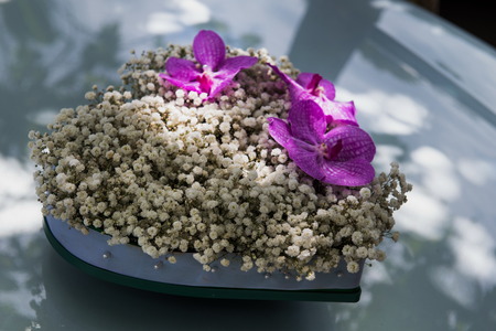 Wedding car, purple orchids and white flowersの写真素材