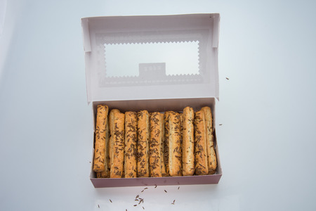 Crackers, cookies with cheese and caraway seeds