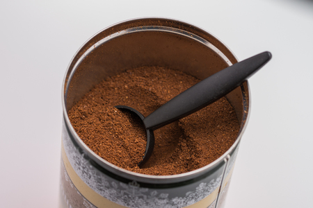 Ground coffee in a metal boxの写真素材